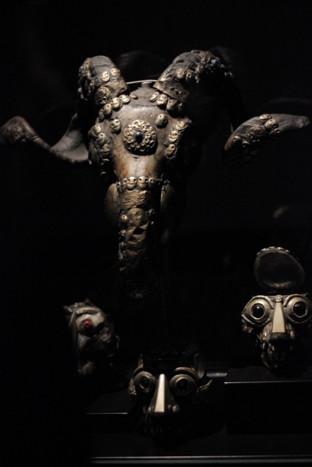Creepy death masks. I believe these ones were from Papua New Guinea. The display cases had low, flickering lights for dramatic effect.