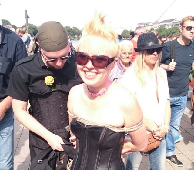 Getting tied up at the BDSM booth at Pride