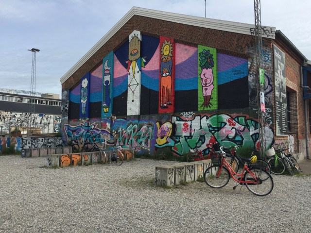 A graffiti-covered wall of Radar club at Godsbanen cultural center in Aarhus, Denmark